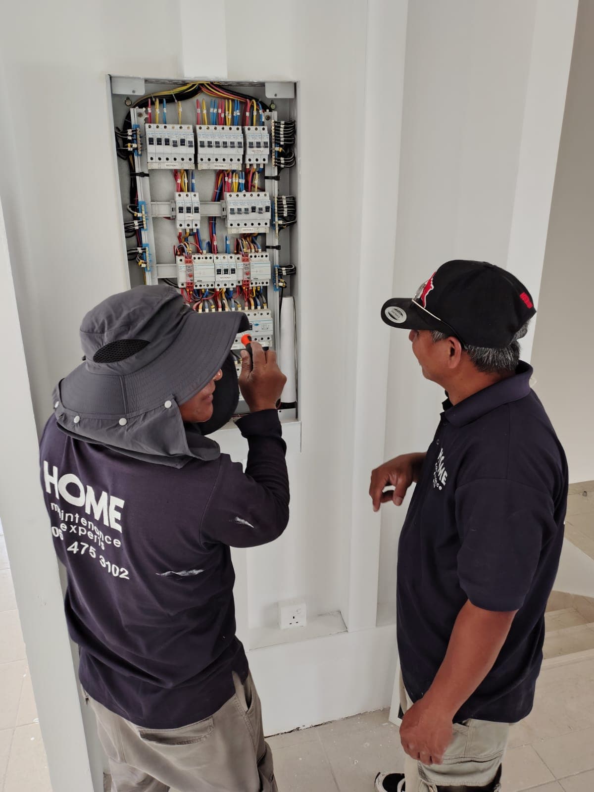 Handyman performing home maintenance