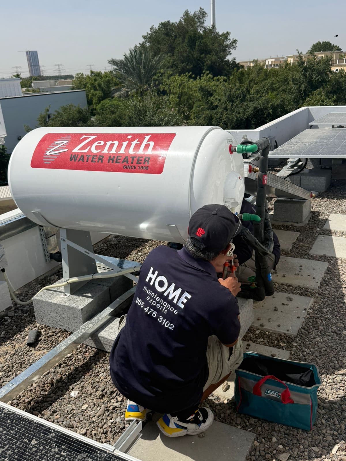 Certified plumber and electrician on a job